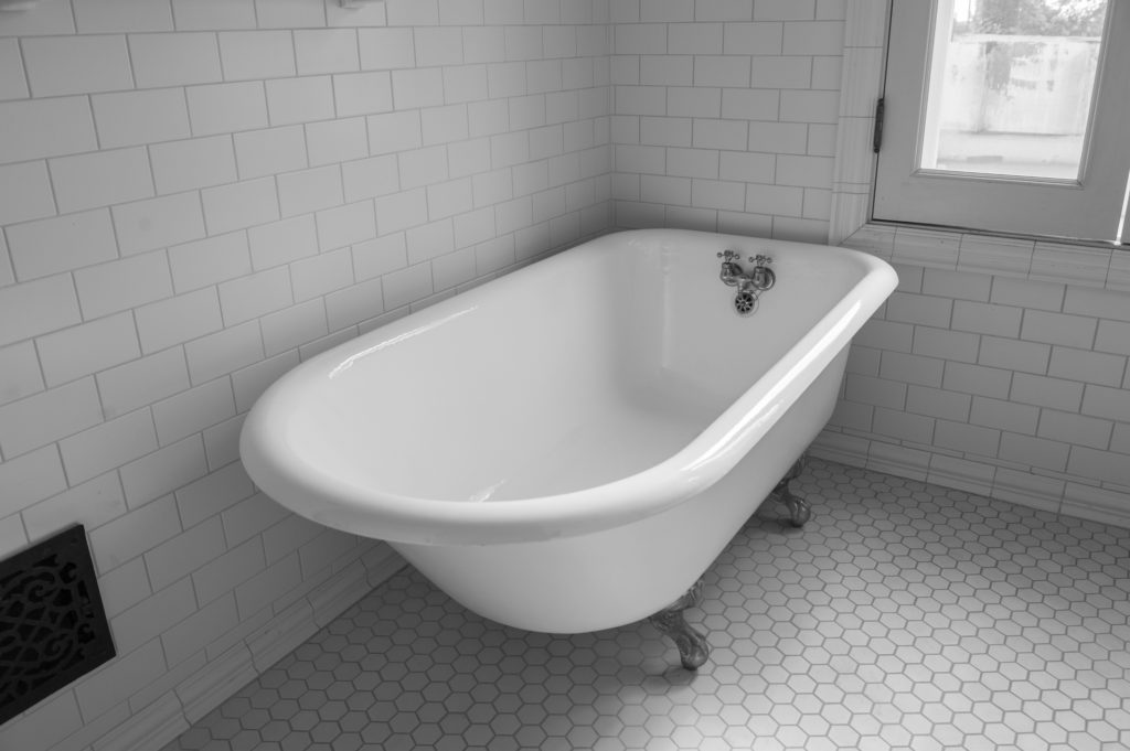 Cast iron tub in bathroom