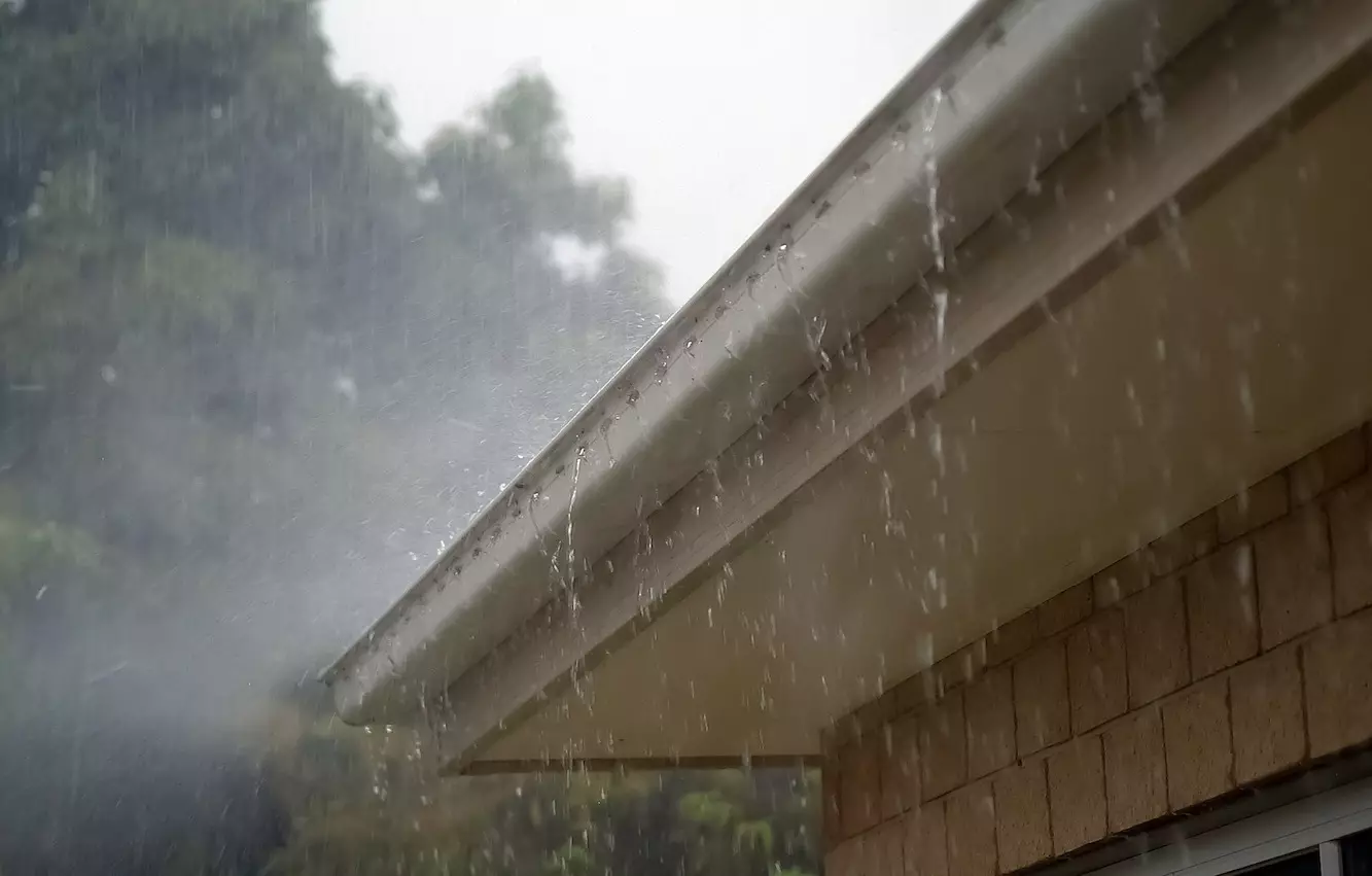 Cleaning your gutters in the fall.